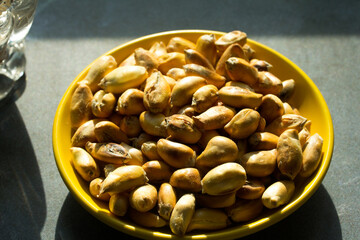 Macro photograph of Peruvian roasted corn on a plate. Natural food concept.