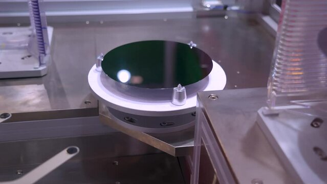 silicon wafers and microcircuits with automation system control application on automate robot arm