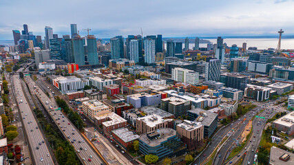 Naklejka premium Modern architecture of stunning metropolis from drone footage. Spectacular skyscrapers standing out in the scenery of Seattle, Washington, the USA.