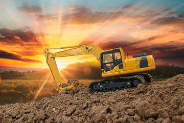 Crawler Excavators with are digging the soil in the construction site on the sunset backgrounds