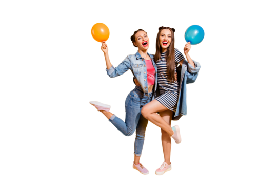Full legs length body size portrait of two funky funny brunette hair lady stand isolated on yellow vivid background with fly ball in hands make beaming wide toothy smile - Powered by Adobe