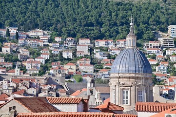 Obraz premium Dome of Dubrovnik Cathedral and Orange Roofs of Buildings in Dubrovnik Old Town on the Adriatic Sea Coast