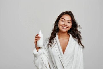 beautiful woman presenter holding a mockup bottle of skincare or shampoo product  ,Skincare product, shampoo,