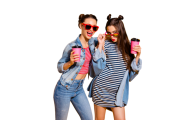 Two beautiful attractive cute sweet gorgeous brunette hair lady look at camera pose isolated on yellow vivid background in glasses spectacles make beaming white smile hold cup in hands