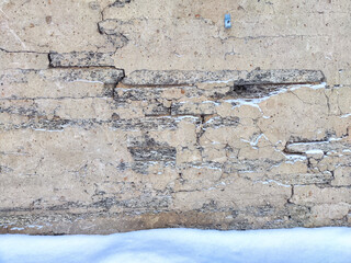 Background, texture of a concrete wall. Weathered Concrete Wall Showcasing Signs of Aging and...