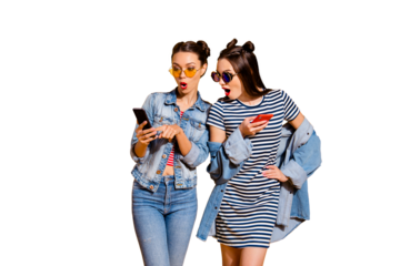 Two leisure lifestyle brunette hair lady in street style stylish glasses spectacles stand isolated on yellow bright background pointer indicate on gadget read send receive sms message wide open mouth