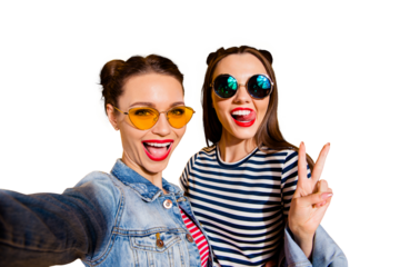 Glad positive grinning adorable good-looking funky funny two lady isolated on yellow vivid background in casual denim jeans wear trendy glasses spectacles take picture on cellular give v-sign