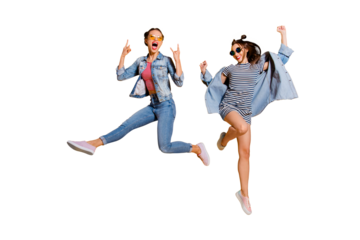 Full legs body size two attractive music lover leisure lifestyle cool lady isolated on yellow vivid background in glasses spectacles dance dancer on concert raised fists up give heavy metal gesture