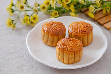 Mooncake on white plate, Chinese mid autumn festival food
