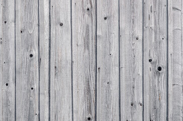 Wooden vintage abstract background concept. Close up of gray wooden fence panels.