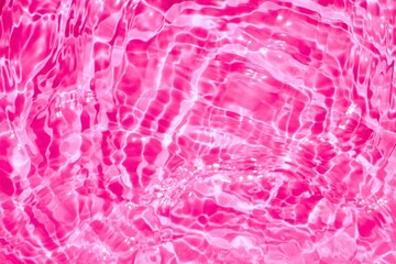 Sunlit pink water Ripples in Summer Bliss, Vibrant pink water with light patterns depicting leisure or summer concepts 
