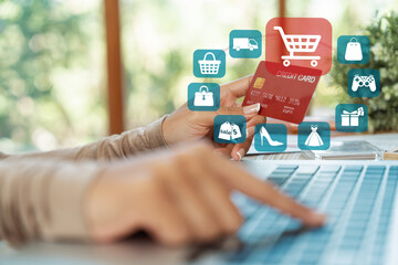 Elegant customer wear brown sweater hold credit card choosing online platform. Smart consumer...