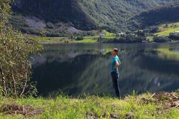 Outdoor life - tourist enjoys Norway