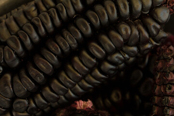 Macro photo of the texture of Peruvian purple corn. Concept of greens and vegetables.