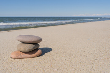 Sea shore, Sand and stack stones. Stones and lines. Concept of zen, balance, harmony.
