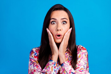 Photo of funky shocked lady dressed print blouse arms cheeks isolated blue color background