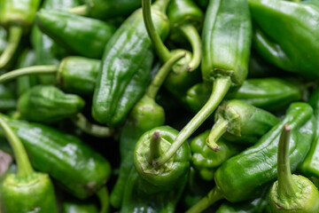Fresh and Healthy Green Peppers: Nutritious Snack Vegetables Available at the Market. Organic, Tasty, and Full of Flavor, Perfect for a Nutritious Diet and Culinary Delights. the Best in Fresh Produce
