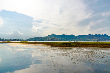  Lake moutain and sky in kampot cambodia