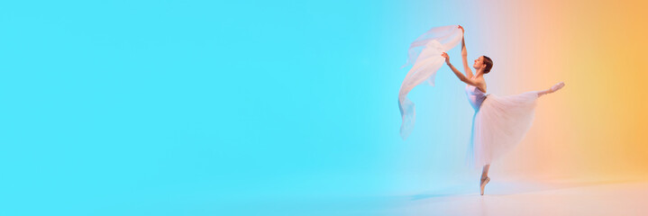 Banner. Charming ballerina dancing with fabric in neon light against blue-orange gradient...