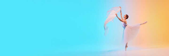 Banner. Charming ballerina dancing with fabric in neon light against blue-orange gradient background with negative space to insert your text. Concept of art, movement, beauty and fashion. Ad © master1305