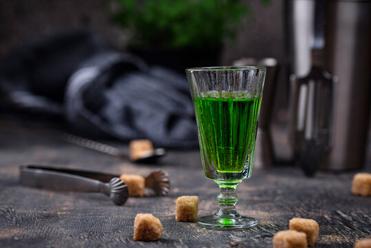 Glass of absinthe with cane sugar