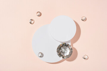 White podium with diamonds on a pink background for product presentation. Minimal concept and hard...