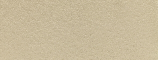 Texture of old light beige color paper background, macro. Structure of a vintage craft sand...