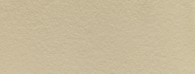 Texture of old light beige color paper background, macro. Structure of a vintage craft sand...