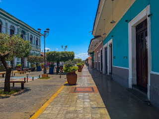Obraz premium Beautiful view of the colonial city of Granada Nicaragua, Its majestic yellow cathedral, Guadalupe Church, the convent museum anda the calzada streets