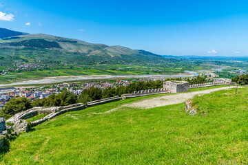 A panorama view over the castle walls towards the Osum river as it approaches the city of Berat,...