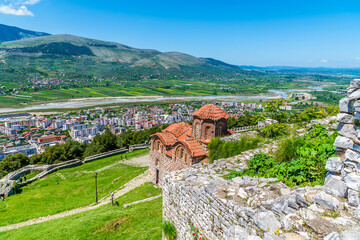 A view past Saint Theodores Church in the castle above the city of Berat, Albania in summertime
