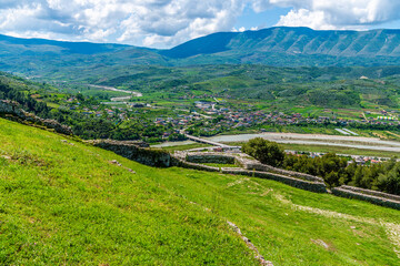 A view from the castle towards a bend in the Osum river above the city of Berat, Albania in...