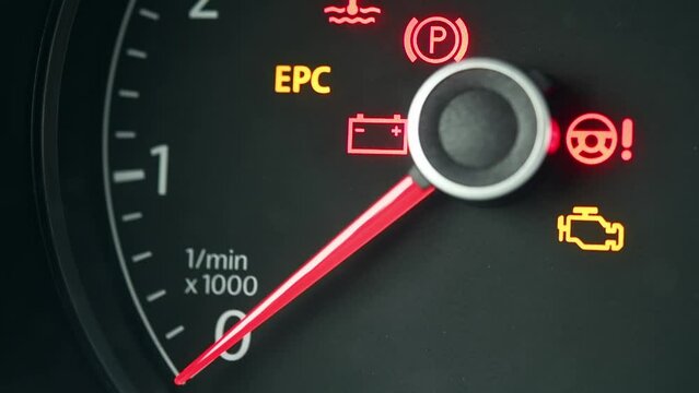 Dashboard with odometer arrow that rises when the vehicle engine is started. Starting the car's engine.