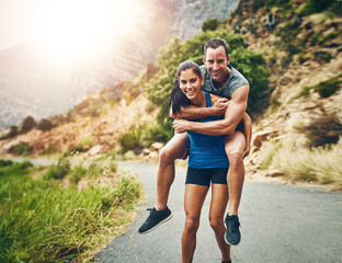 Couple, road and happy with piggyback for fitness on portrait, support and love in California....