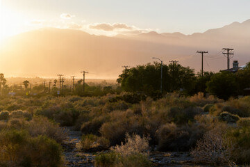 iconic and breathtaking sunset outside Palm Springs along the highway road in the evening. Vivid...