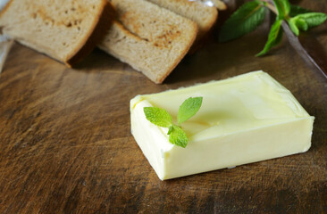organic dairy product butter on wooden background
