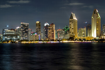 the iconic and breathtaking skyline of San Diego downtown at night. With a thousand lights on the...