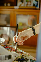 Cropped image of artist woman's hand drawing