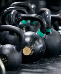 Gym, equipment and kettlebell for exercise, iron and sports for strength. Functional fitness, weight and lifting for strong athlete and training for health and wellness, bodybuilding and gear in club
