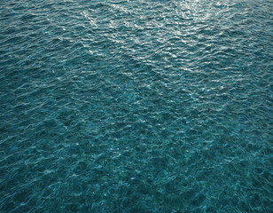 Obraz premium blue sea water with sunlight shining