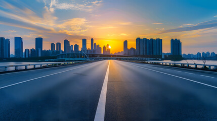 Asphalt road and bridge with modern city skyline at sunset in Ningbo Zhejiang Province China :...