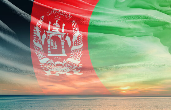 Afghanistan national flag waving in the sky.