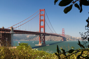 the unique and world famous Golden Gate Bridge at a clear sky sunny morning in san francisco