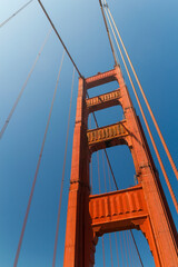 the unique and world famous Golden Gate Bridge at a clear sky sunny morning in san francisco