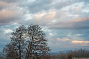 Beautiful clouds during sunset at a Bulgarian countryside in warm winter.