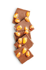 Broken chocolate bar with almonds isolated on white background.