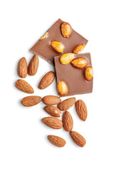 Broken chocolate bar with almonds isolated on white background.