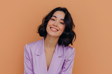 smiling woman with black hair wearing pastel purple summer suit, brown solid color background