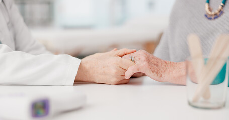 Senior woman, doctor and holding hands with patient in elderly care, love or consultation at the...