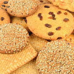 A collage of different kind of biscuits, sweets and pastries.